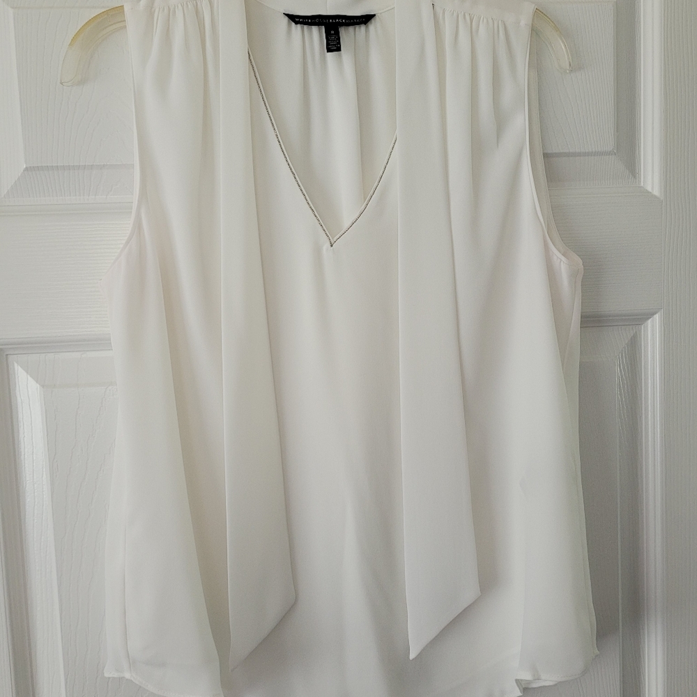 White house black market sleeveless white blouse with attached scarf. Size 8.